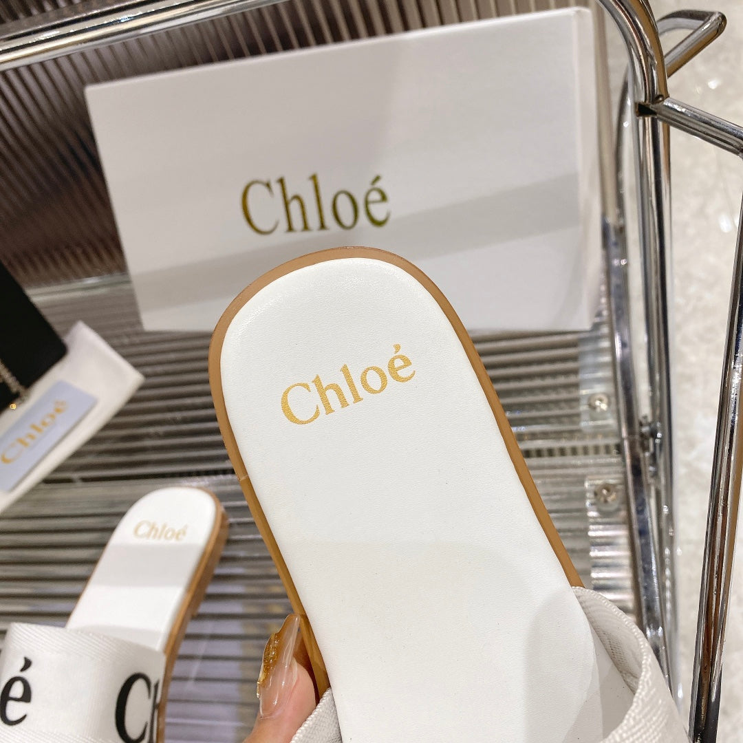 CHLOÉ WOODY SLIPPER IN WHITE MIX BLACK CANVAS