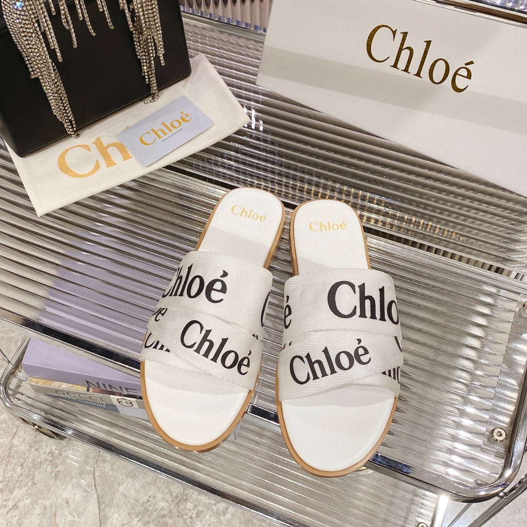 CHLOÉ WOODY SLIPPER IN WHITE MIX BLACK CANVAS