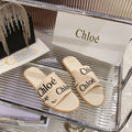 CHLOÉ WOODY SLIPPER IN BEIGE MIX BLACK CANVAS