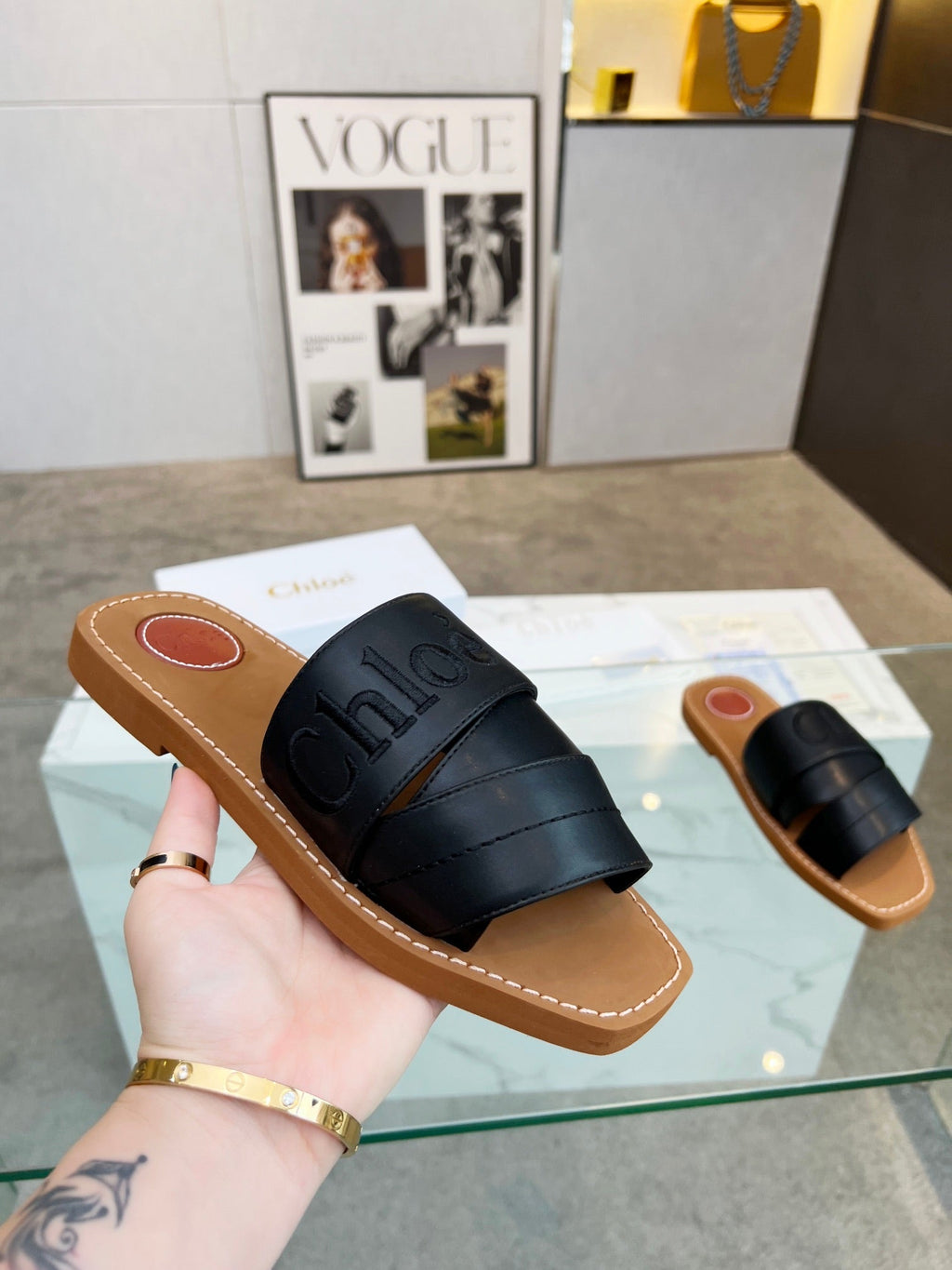 WOODY MULE IN BLACK LAMBSKIN WITH EMBROIDERED LOGO