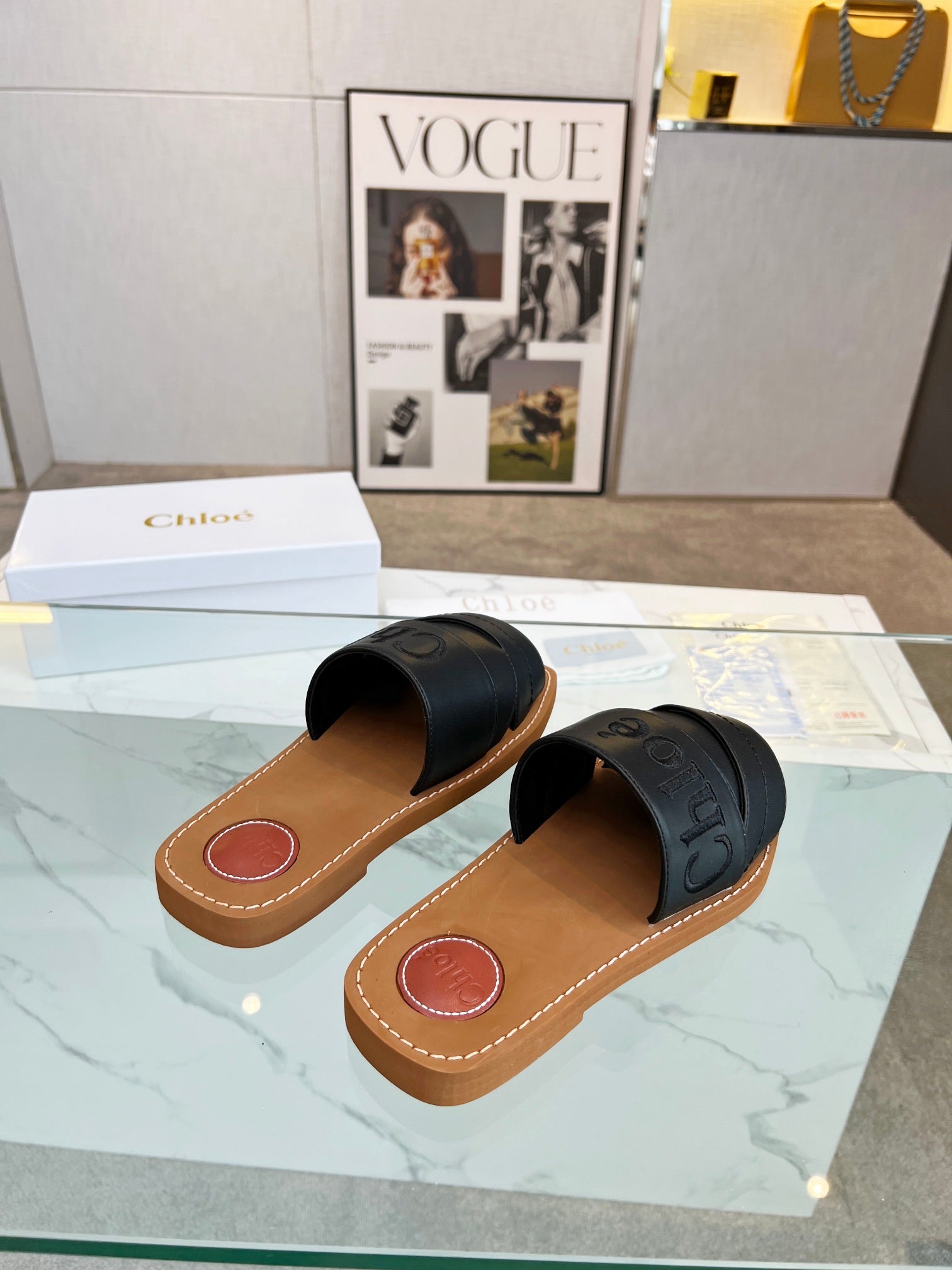 CHLOÉ WOODY MULE IN BLACK LAMBSKIN WITH EMBROIDERED LOGO