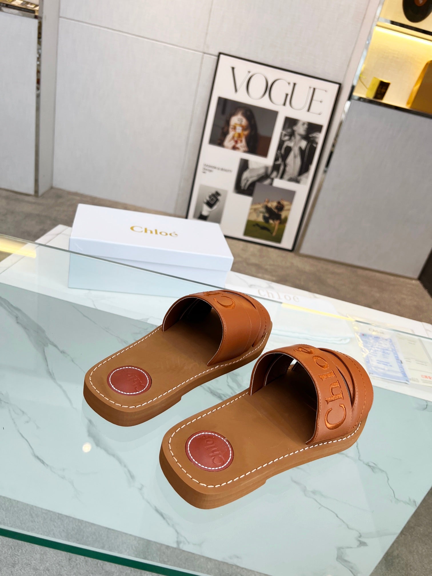 WOODY MULE IN BRONZE BROWM LAMBSKIN WITH EMBROIDERED LOGO