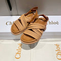 CHLOÉ CROSS STRAP SANDAL IN BRONZE BROWN RUBBER WITH GOLD HARDWARE