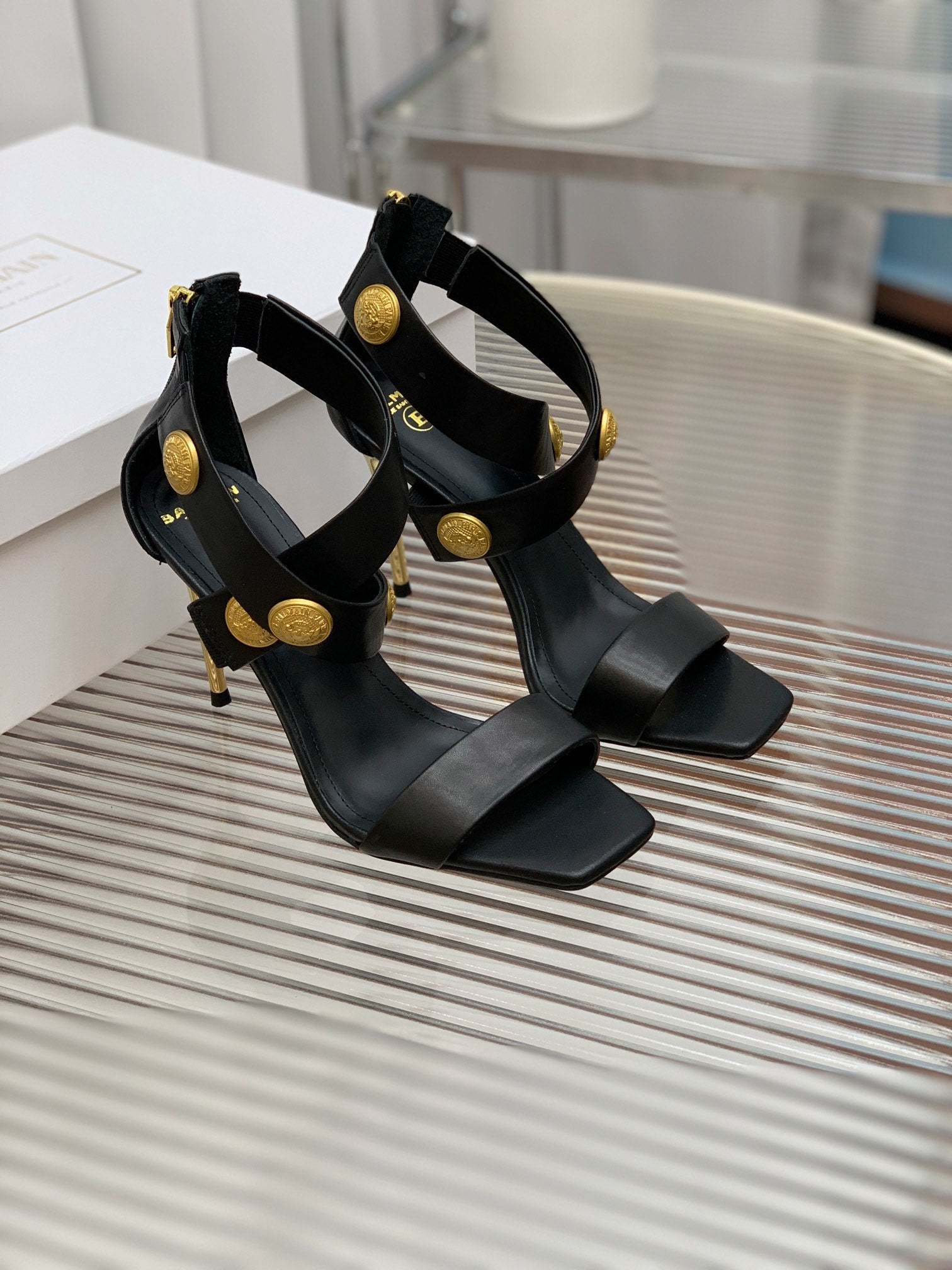 BALMAIN 25S CROSSOVER STRAP HIGH HEELS 95MM IN BLACK CALFSKIN