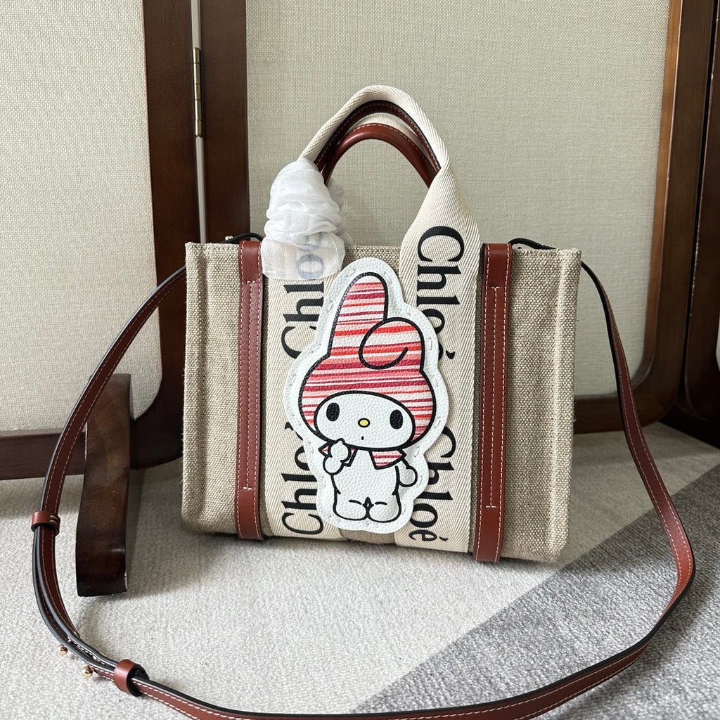 MY MELODY SMALL WOODY TOTE BAG 26.5 IN NATURAL FIBERS BEIGE WEBBING BROWN CALFSKIN