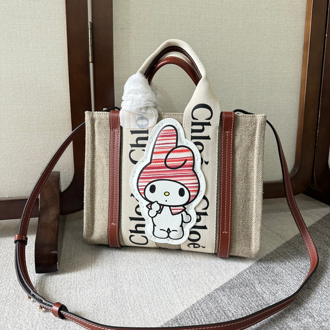 MY MELODY SMALL WOODY TOTE BAG 26.5 IN NATURAL FIBERS BEIGE WEBBING BROWN CALFSKIN