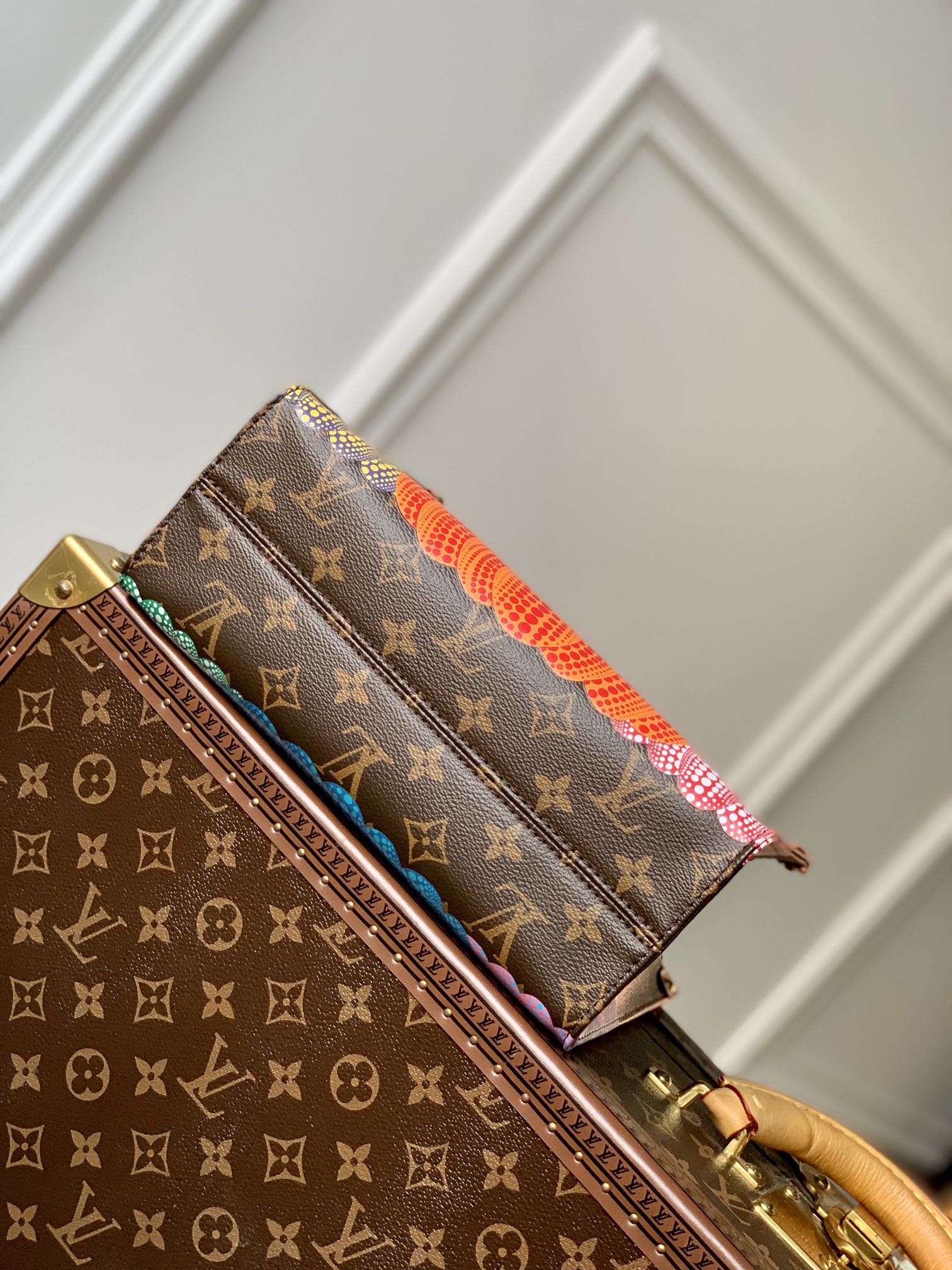LV x YK ONTHEGO 25 IN BROWN MONOGRAM COATED CANVAS AND CALFSKIN PUMPKIN PATTERN