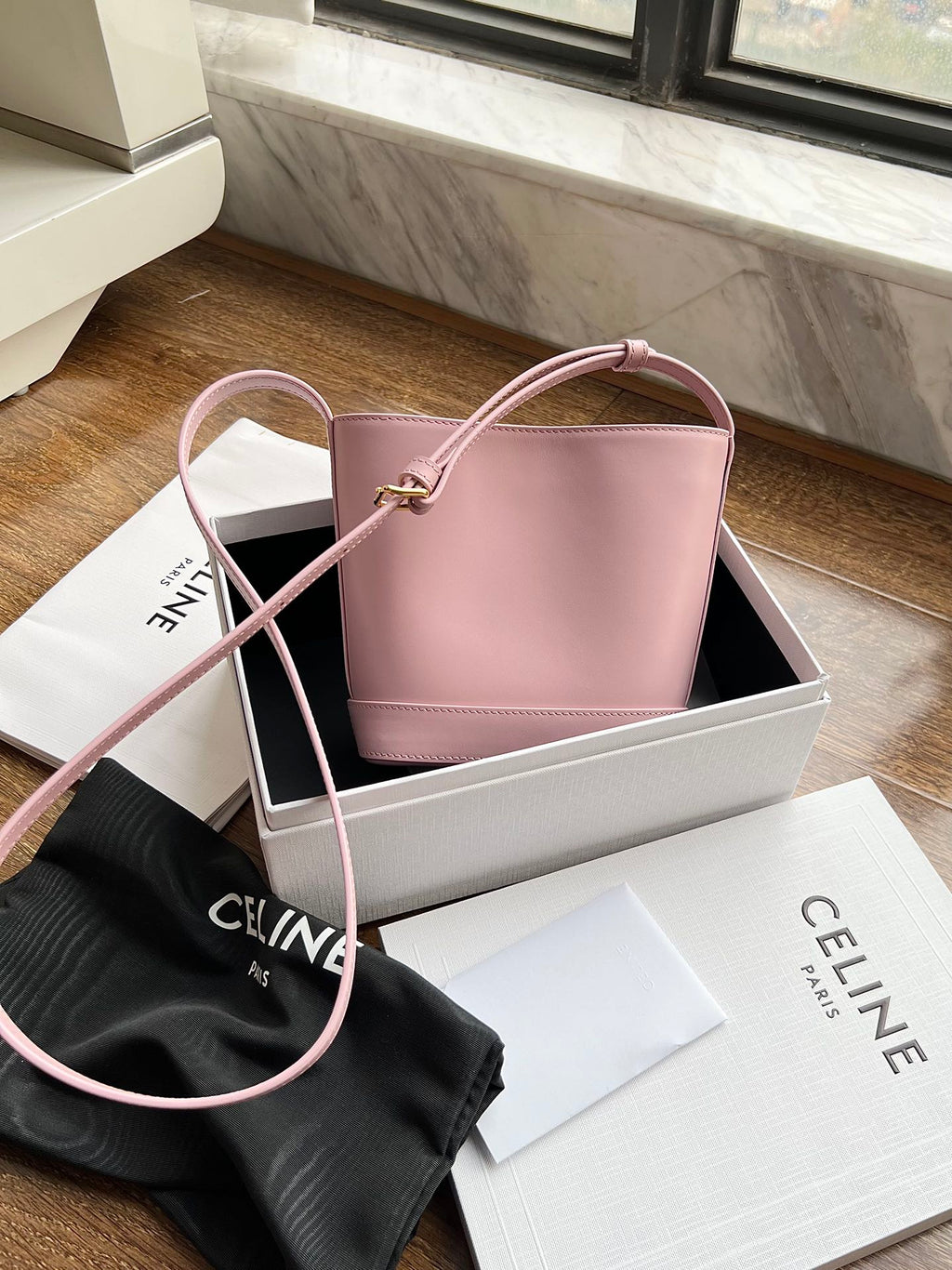 CUIR TRIPHOME 19 PINK PASTEL SMOOTH CALFSKIN BUCKET BAG