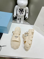 MONOLITH SLIPPER SANDALS IN BEIGE RUBBER