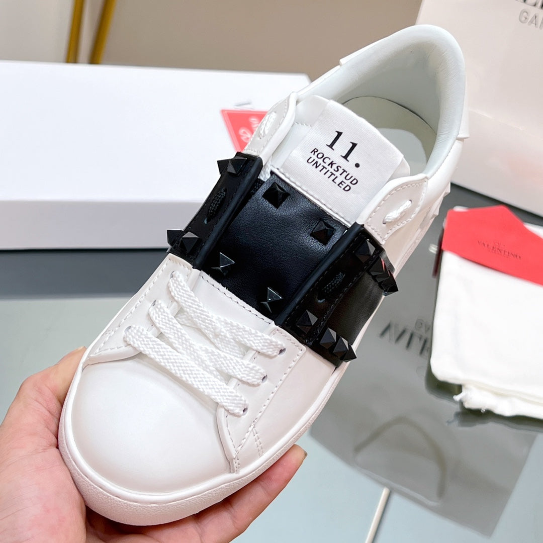 VALENTINO 25S GARAVANI ROCKSTUD UNTITLED STUDDED SNEAKERS IN WHITE MIX BLACK LAMBSKIN
