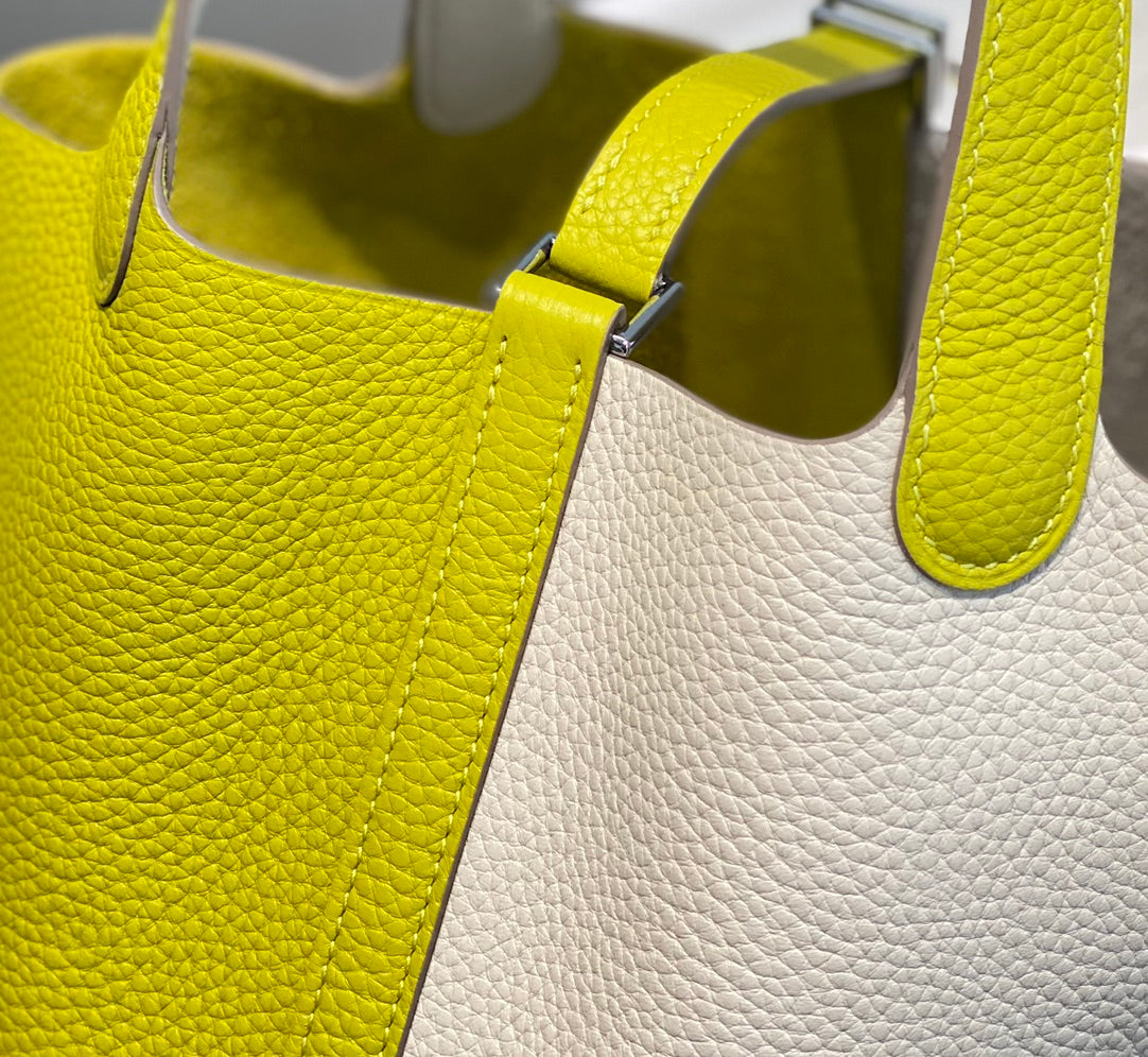 HERMES 25S PICOTIN LOCK 18 IN WHITE AND LEMON YELLOW CALFSKIN SILVER HARDWARE