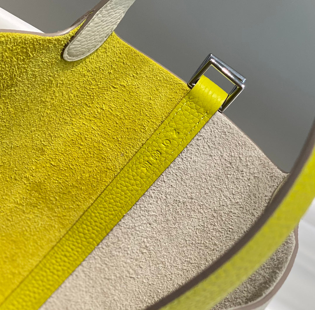 HERMES 25S PICOTIN LOCK 18 IN WHITE AND LEMON YELLOW CALFSKIN SILVER HARDWARE