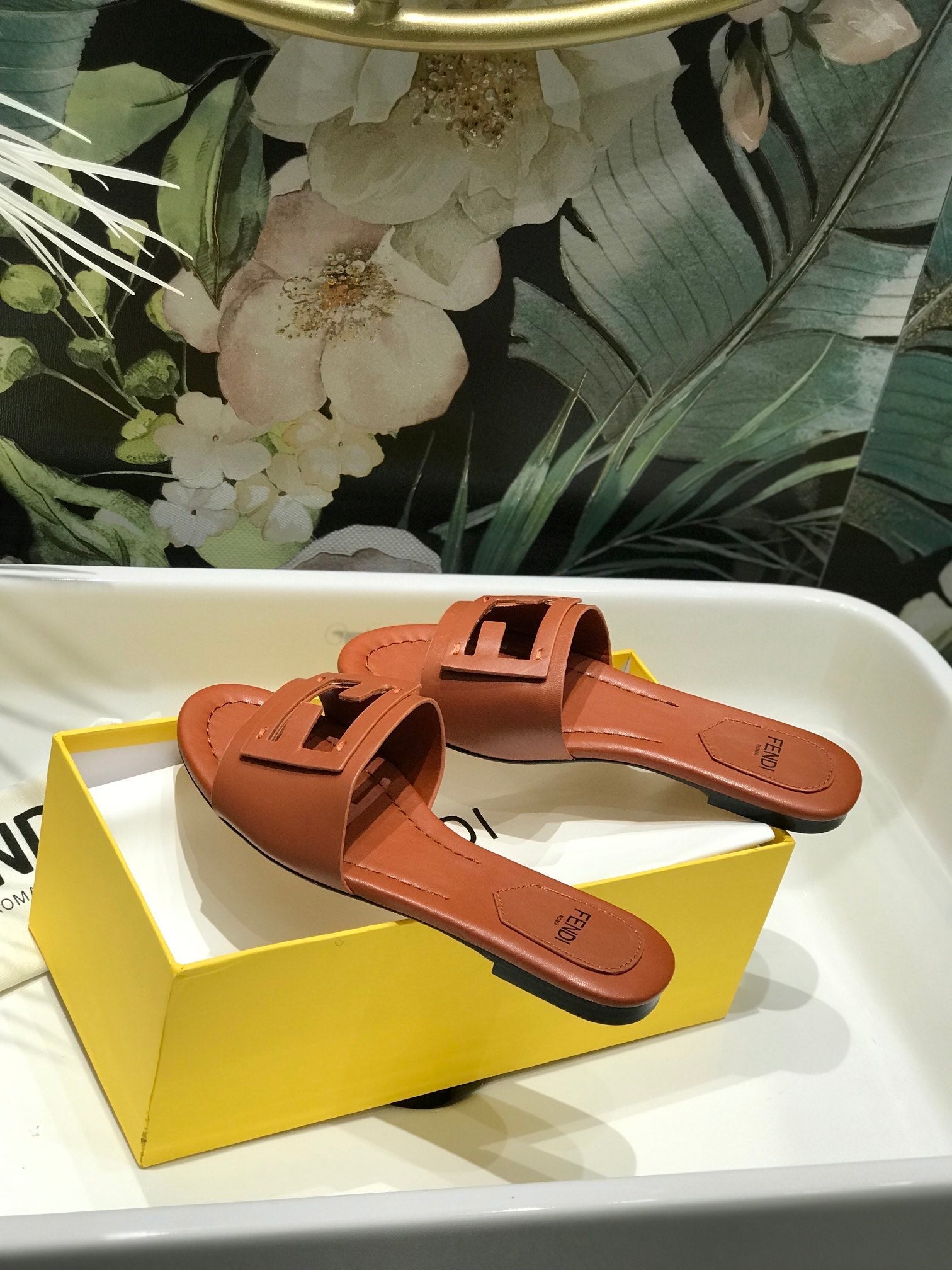 FENDI BAGUETTE SLIDES IN CINNAMON BROWN LAMBSKIN