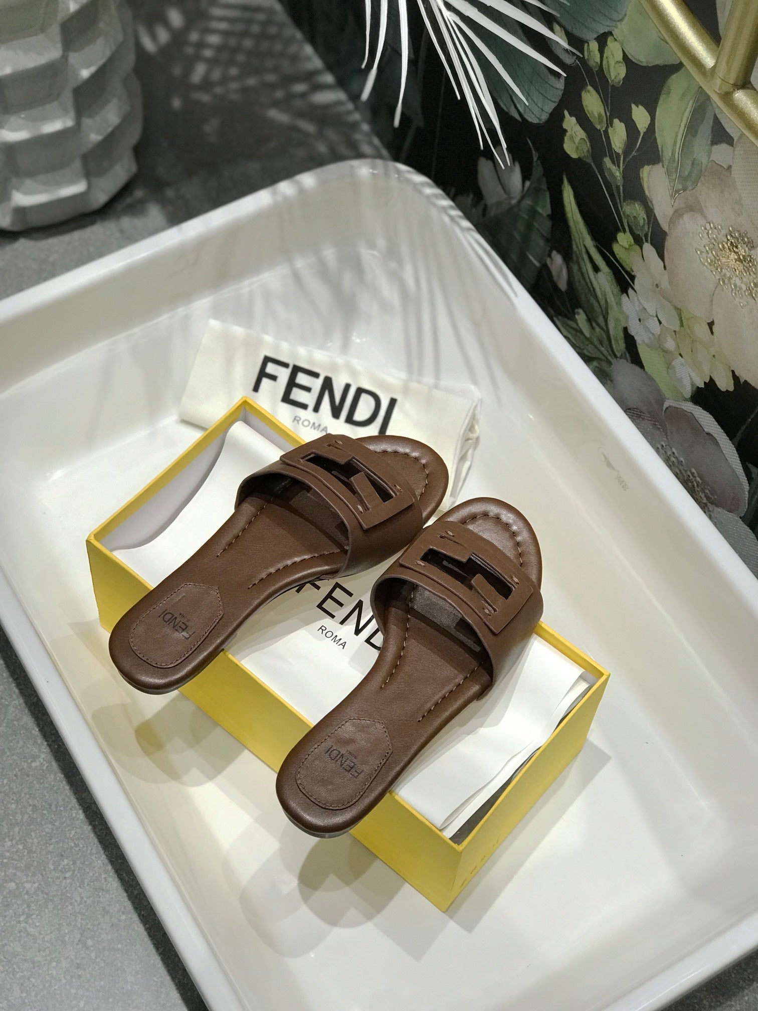 FENDI BAGUETTE SLIDES IN COFFEE BROWN LAMBSKIN