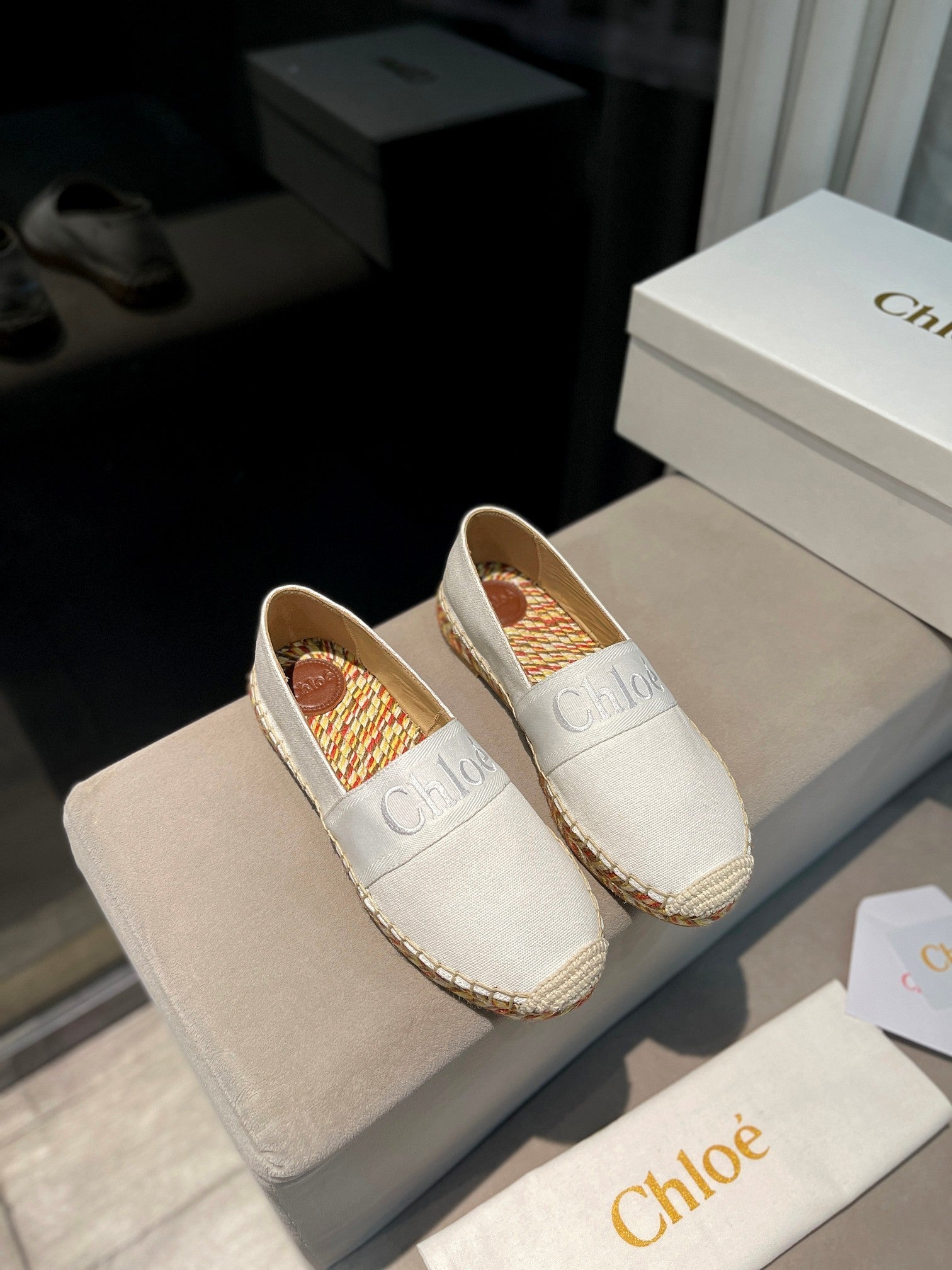 LOAFERS IN WHITE FABRIC AND RAFFIA