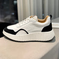 CHLOÉ NAMA SNEAKER IN WHITE LAMBSKIN AND BLACK SUEDE