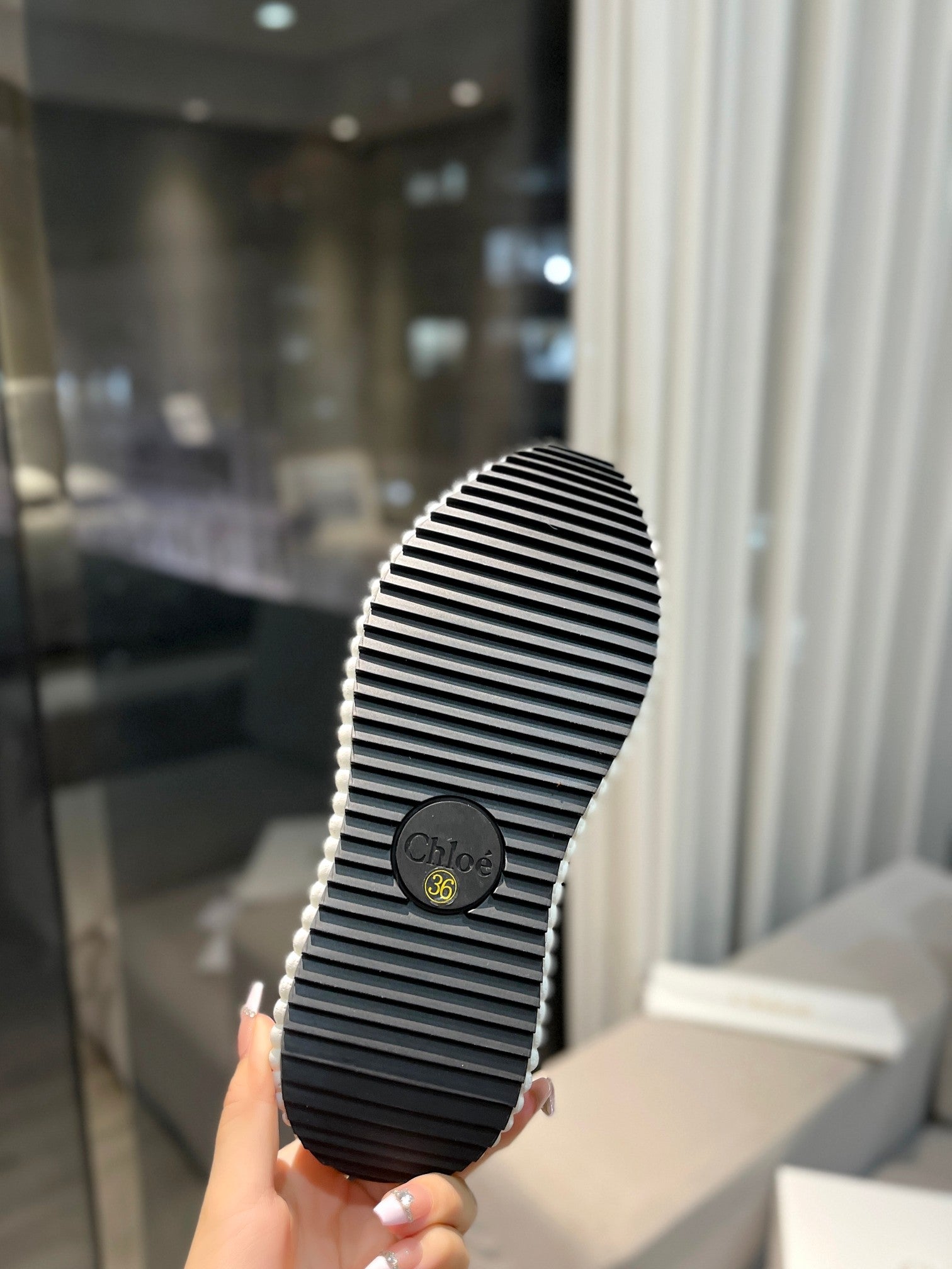 CHLOÉ NAMA SNEAKER IN WHITE LAMBSKIN AND BLACK SUEDE