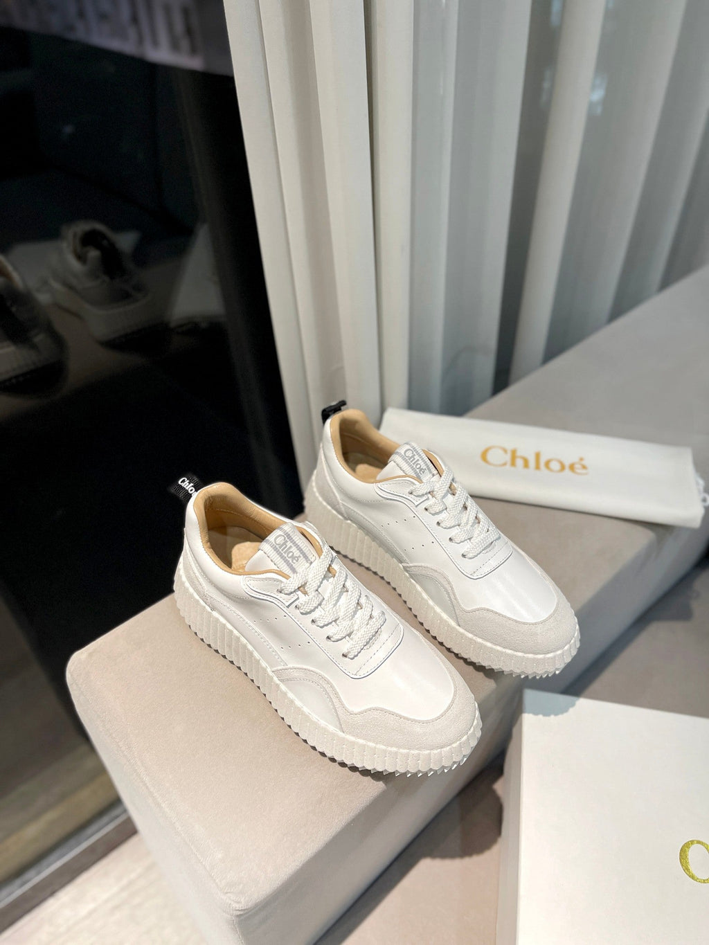 CHLOÉ NAMA SNEAKER IN WHITE LAMBSKIN AND DOVE GREY SUEDE