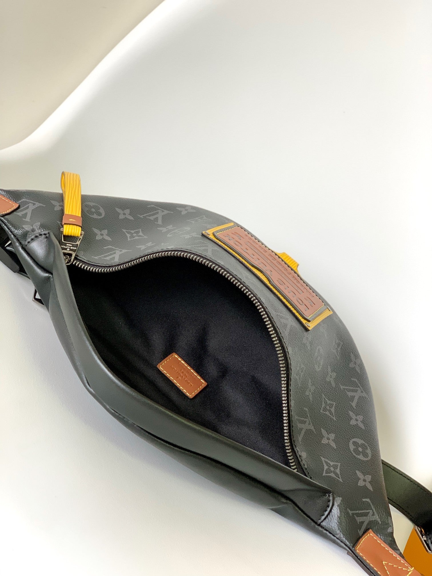 LV 25S BUMBAG 37 IN BLACK AND YELLOW COATED MONOGRAM CALFSKIN