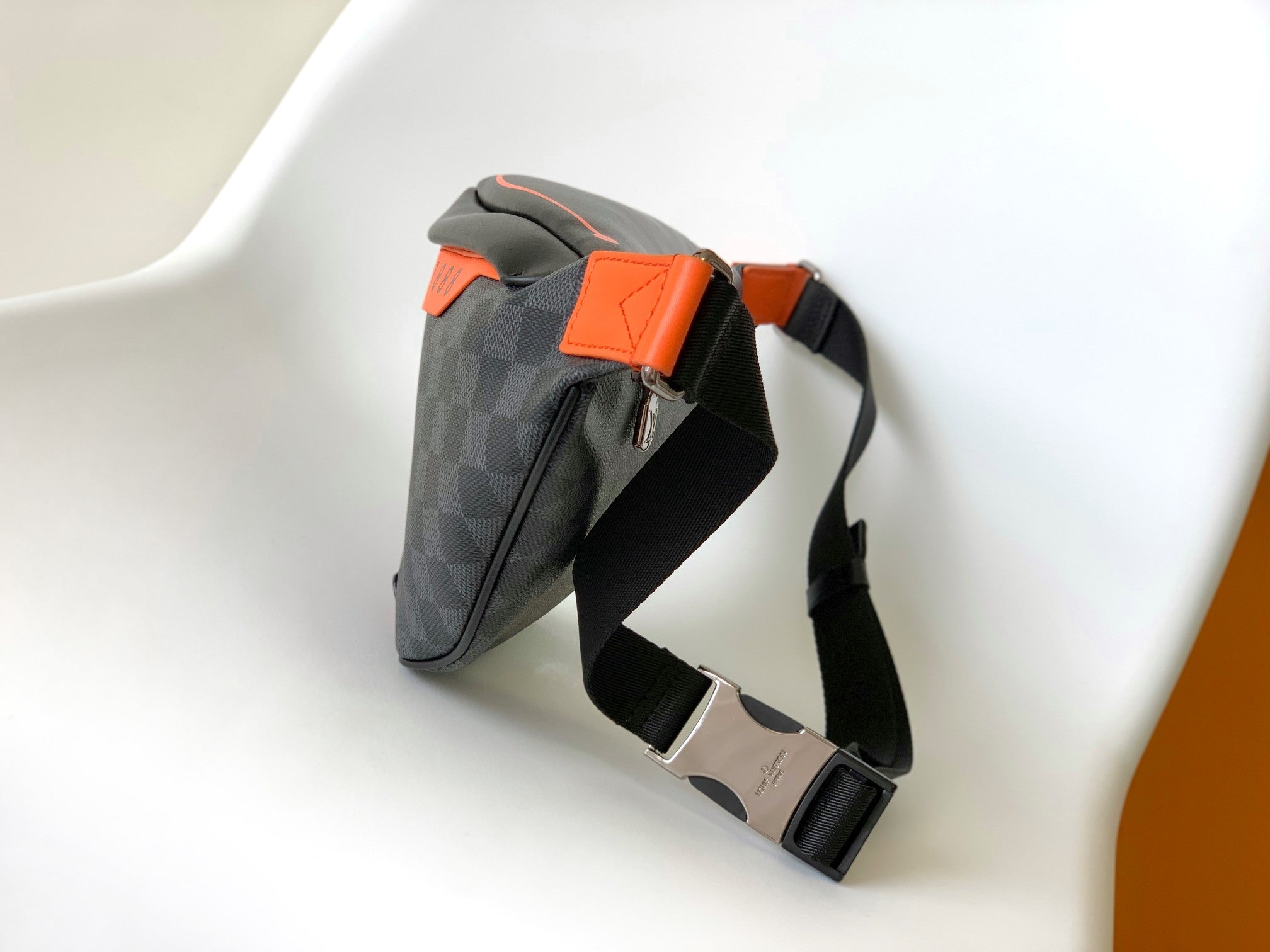 LV 25S BUMBAG 37 IN BLACK AND ORANGE COATED MONOGRAM CALFSKIN