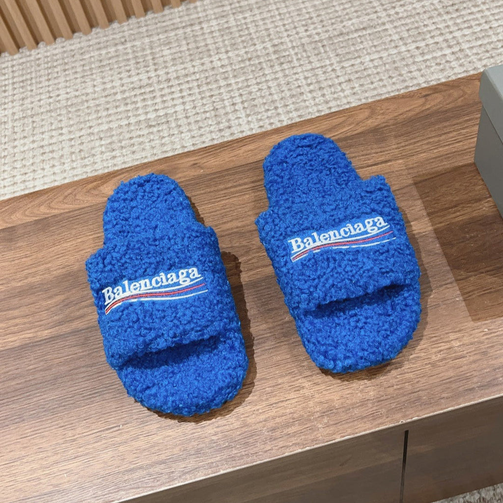 FURRY SLIDES IN COBALT BLUE CURLY SHEARLING