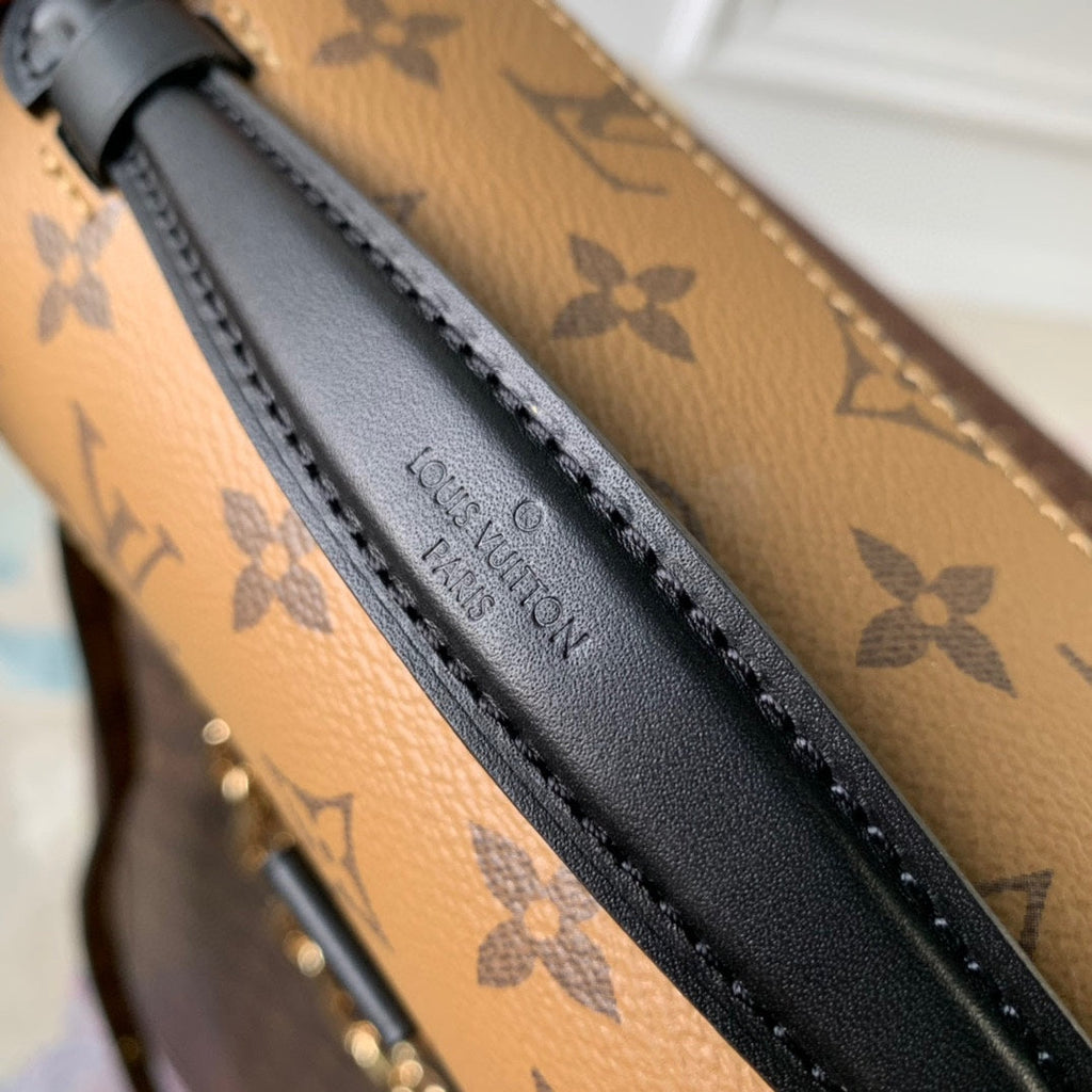 POCHETTE MÉTIS EAST WEST 21.5 IN BROWN MONOGRAM COATED CANVAS AND CALFSKIN