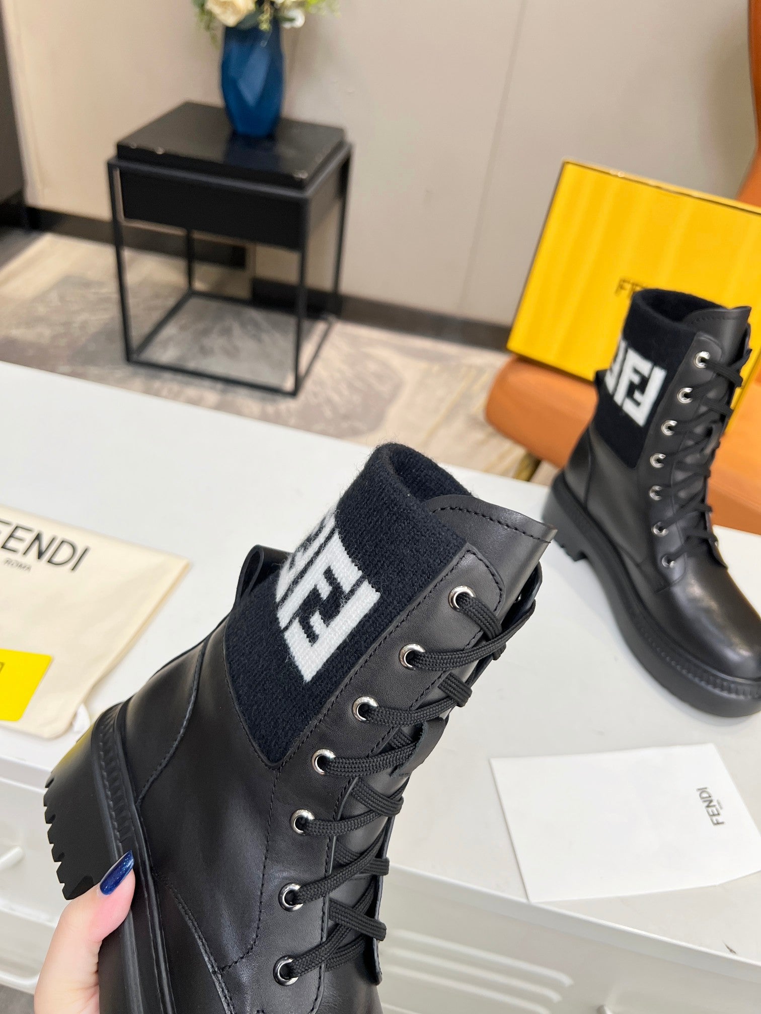 FENDI MARTIN BOOTS IN BLACK CALFSKIN AND FUR