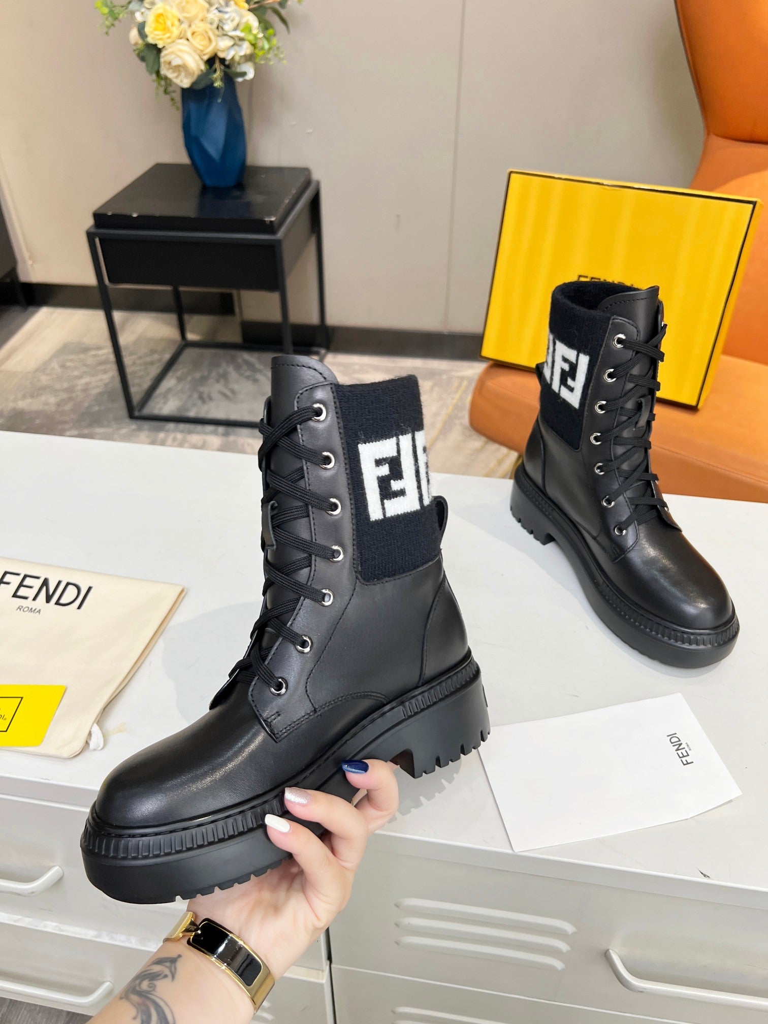 FENDI MARTIN BOOTS IN BLACK CALFSKIN AND FUR