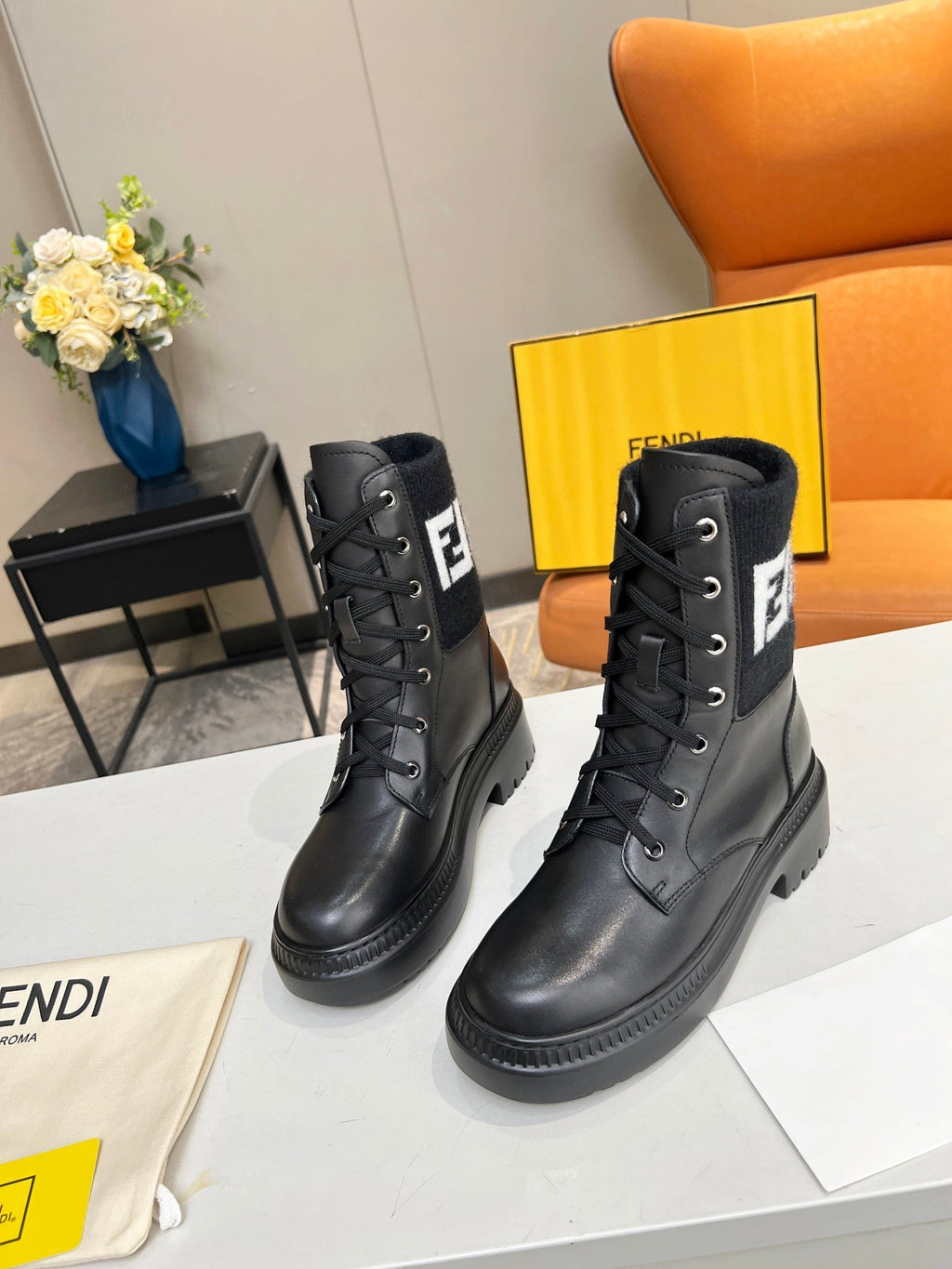 FENDI MARTIN BOOTS IN BLACK CALFSKIN AND FUR