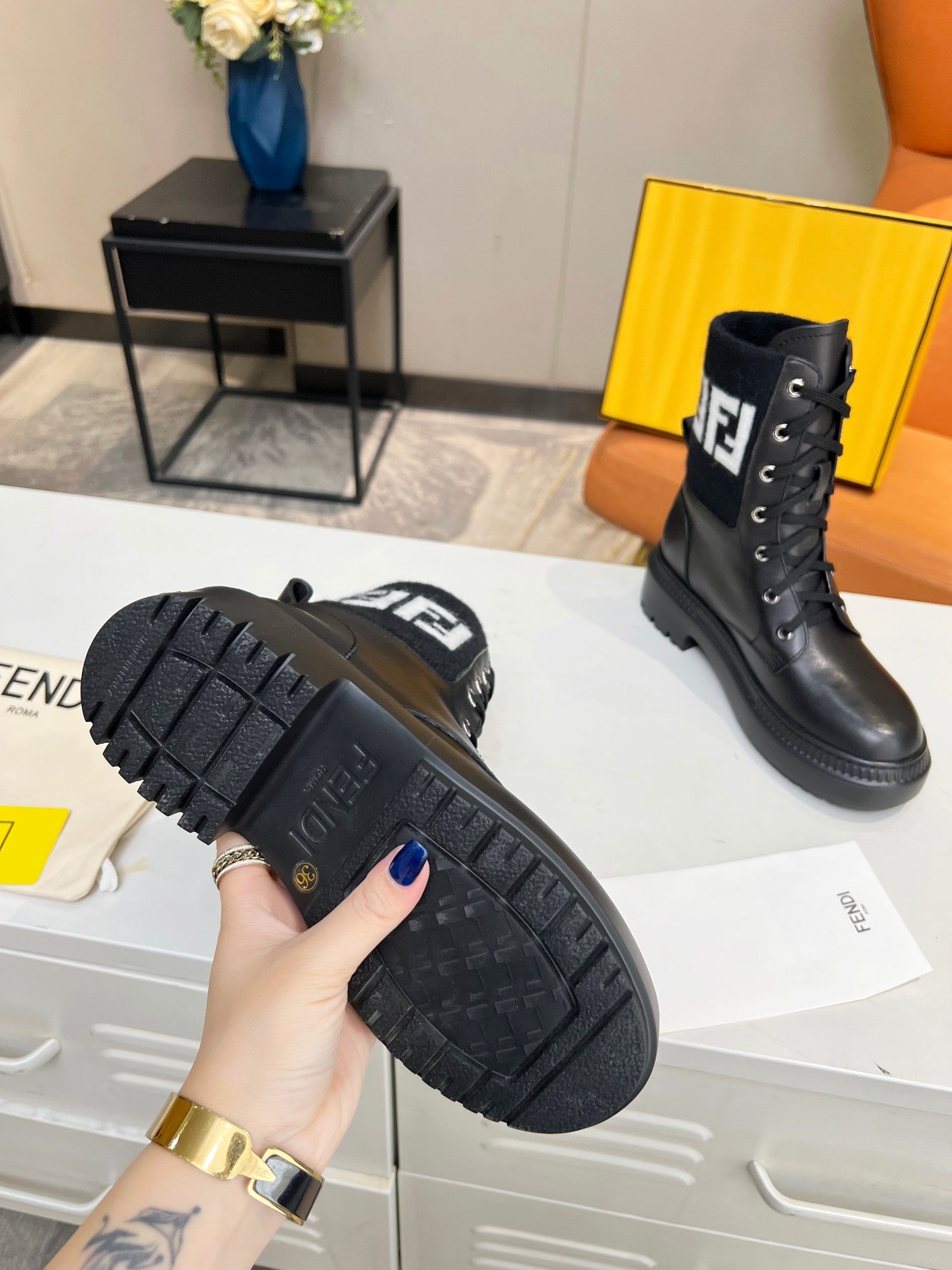 FENDI MARTIN BOOTS IN BLACK CALFSKIN AND FUR