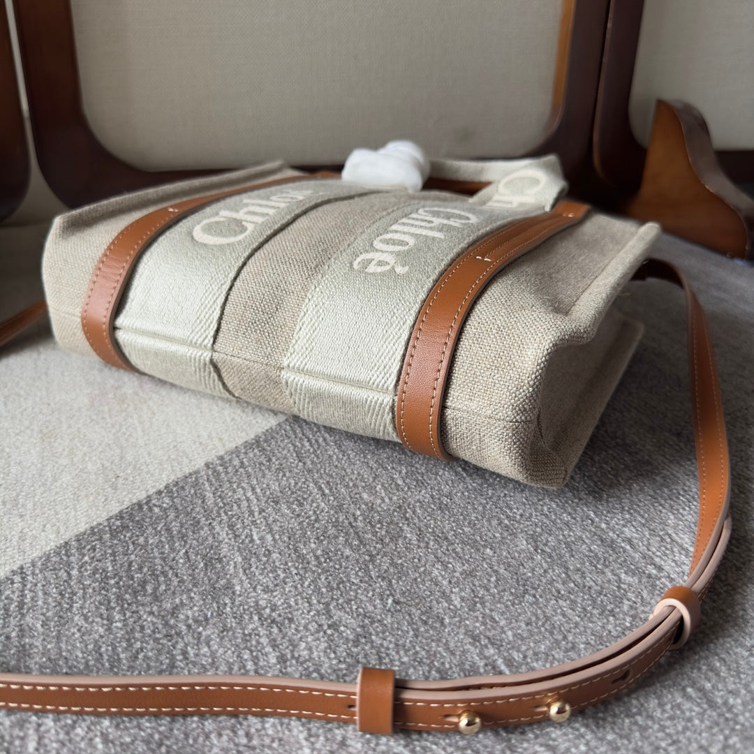 SMALL WOODY TOTE BAG 26.5 IN BEIGE LINEN CANVAS WEBBING LOGO EMBROIDERY BROWN CALFSKIN