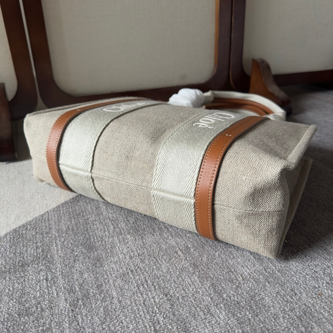 MEDIUM WOODY TOTE BAG 37 IN BEIGE LINEN CANVAS WEBBING LOGO EMBROIDERY BROWN CALFSKIN