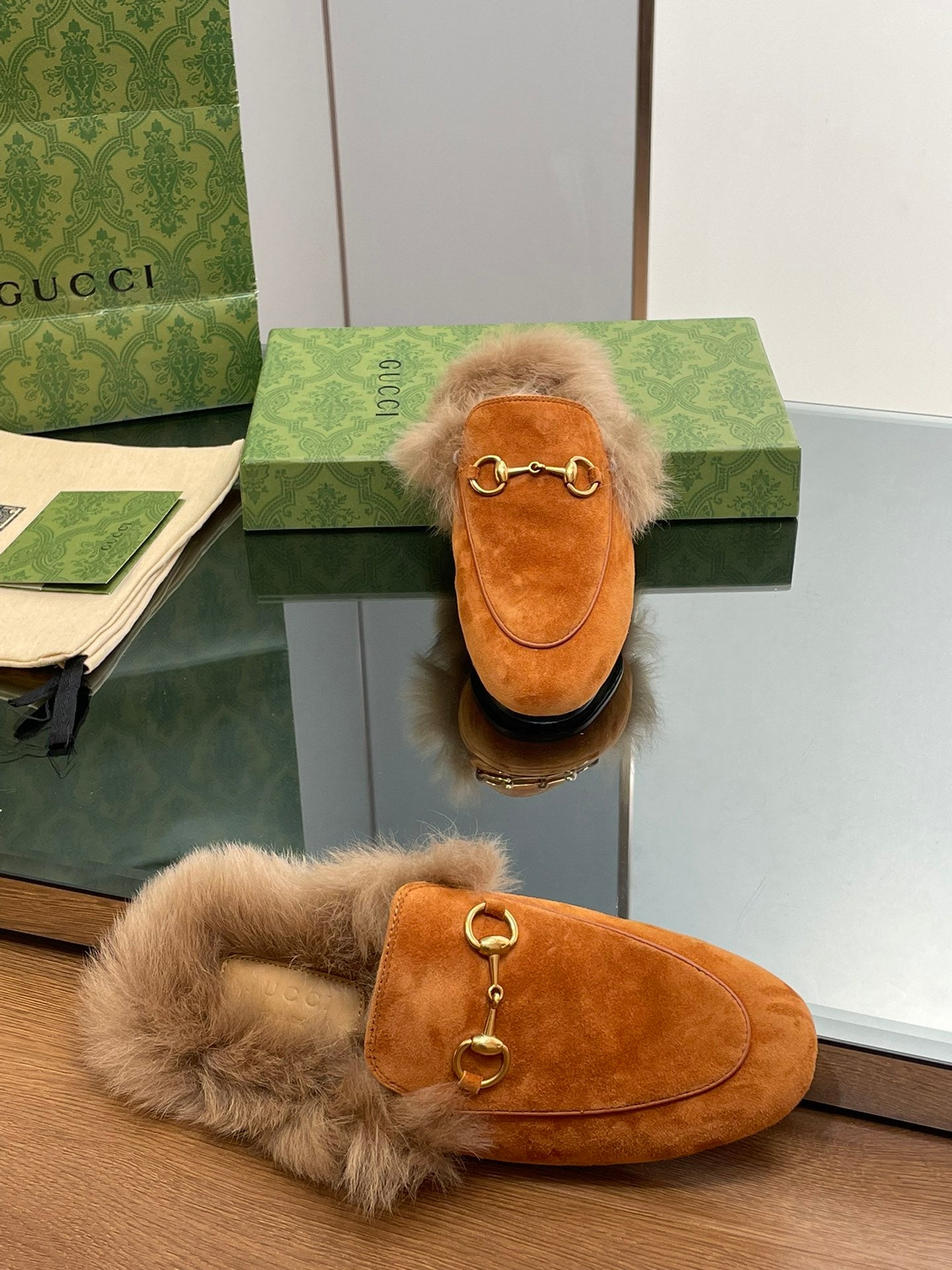HORSEBIT MULE IN BRONZE ORANGE SUEDE AND LAMB WOOL LINING