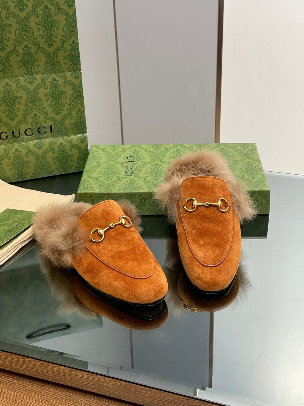 HORSEBIT MULE IN BRONZE ORANGE SUEDE AND LAMB WOOL LINING