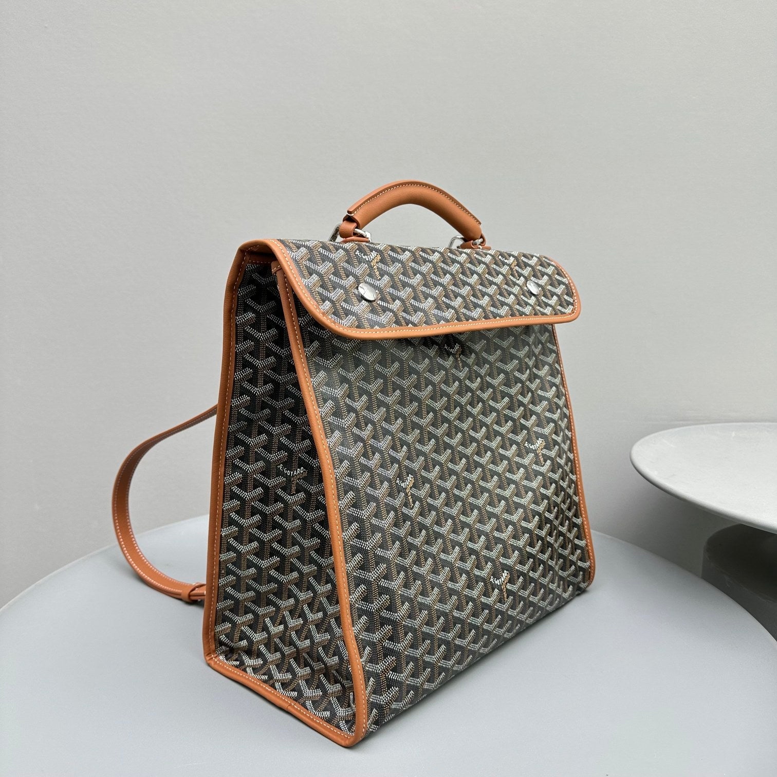 LEGER BACKPACK 37 IN BLACK GOYARDINE CANVAS WITH TAN CALFSKIN TRIM