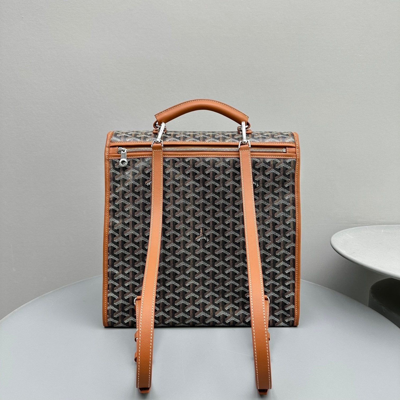 LEGER BACKPACK 37 IN BLACK GOYARDINE CANVAS WITH TAN CALFSKIN TRIM