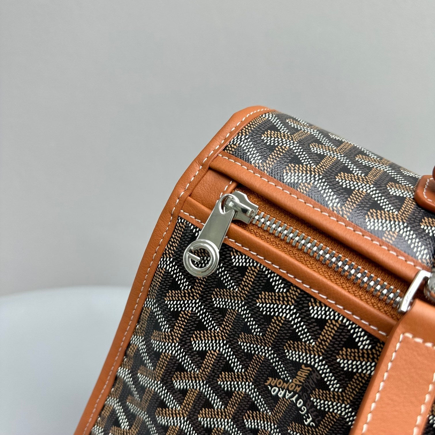 LEGER BACKPACK 37 IN BLACK GOYARDINE CANVAS WITH TAN CALFSKIN TRIM