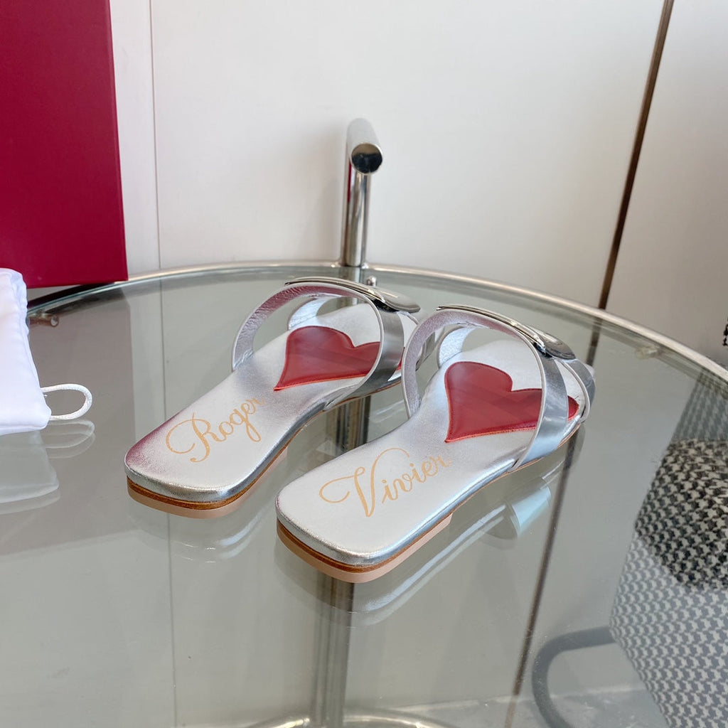 VIV' BY THE SEA LOVE METAL MULES IN SILVER PATENT CALFSKIN