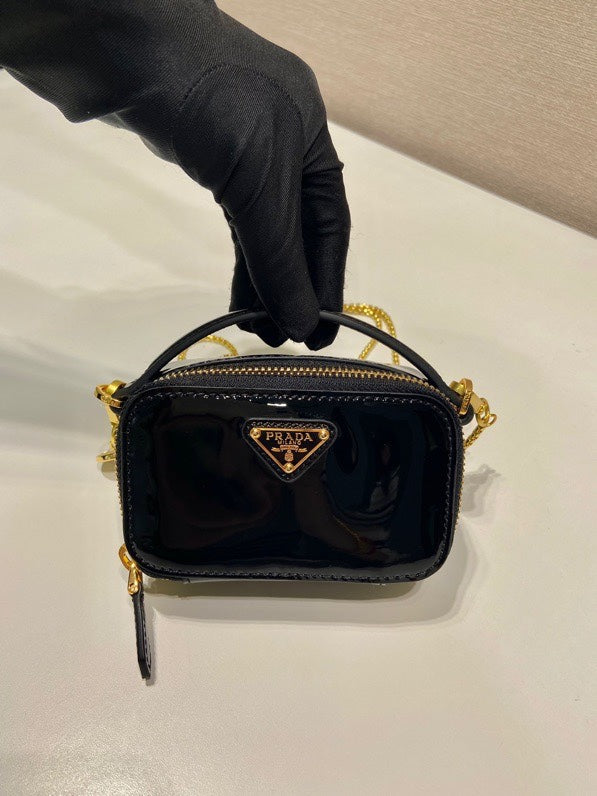 MINI HAND BAG 11 WITH GOLD STRAP IN BLACK PATENT CALFSKIN