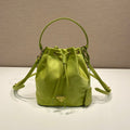 BUCKET BAG 19 IN APPLE GREEN RE-NYLON AND SAFFIANO LEATHER HANDLE
