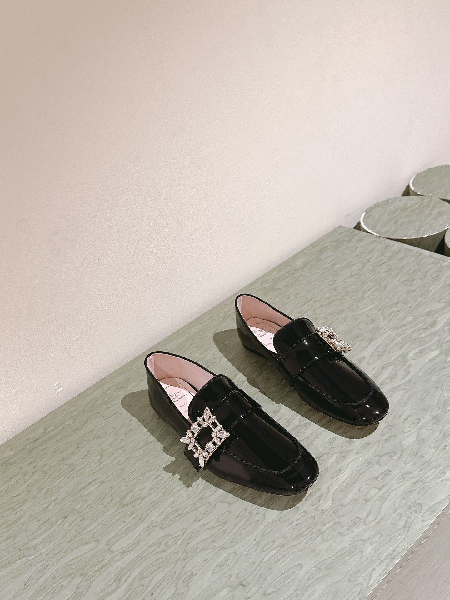 MINI BROCHE VIVIER BUCKLE LOAFERS IN BLACK PATENT CALFSKIN