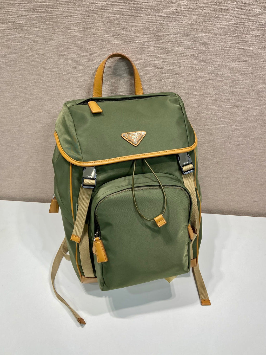 BACKPACK 45 IN SEAWEED GREEN RE-NYLON AND BROWN CALFSKIN TRIM