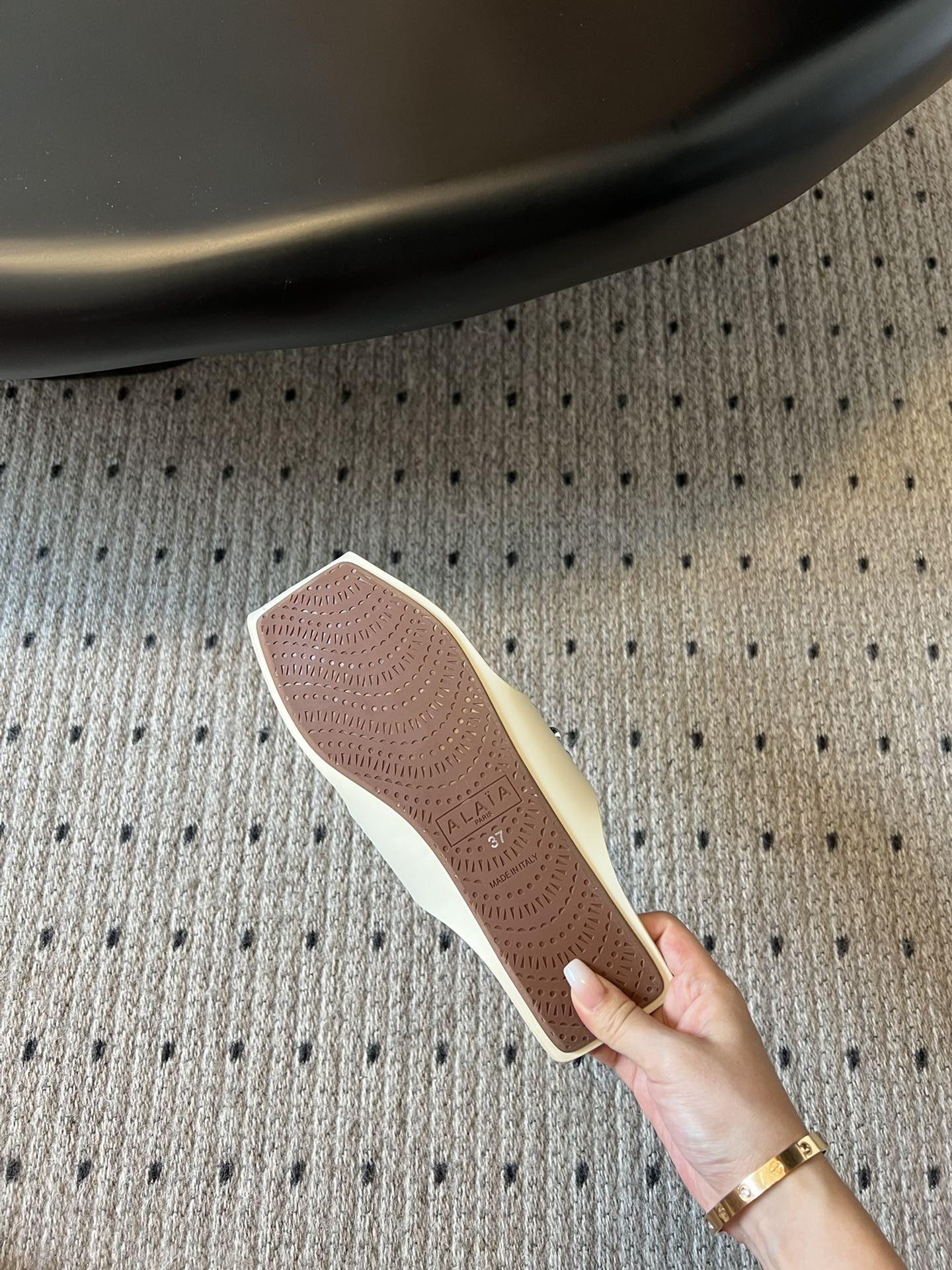 ALAIA FOLDED FLAT MULES WITH SPHERES ON WHITE CALFSKIN