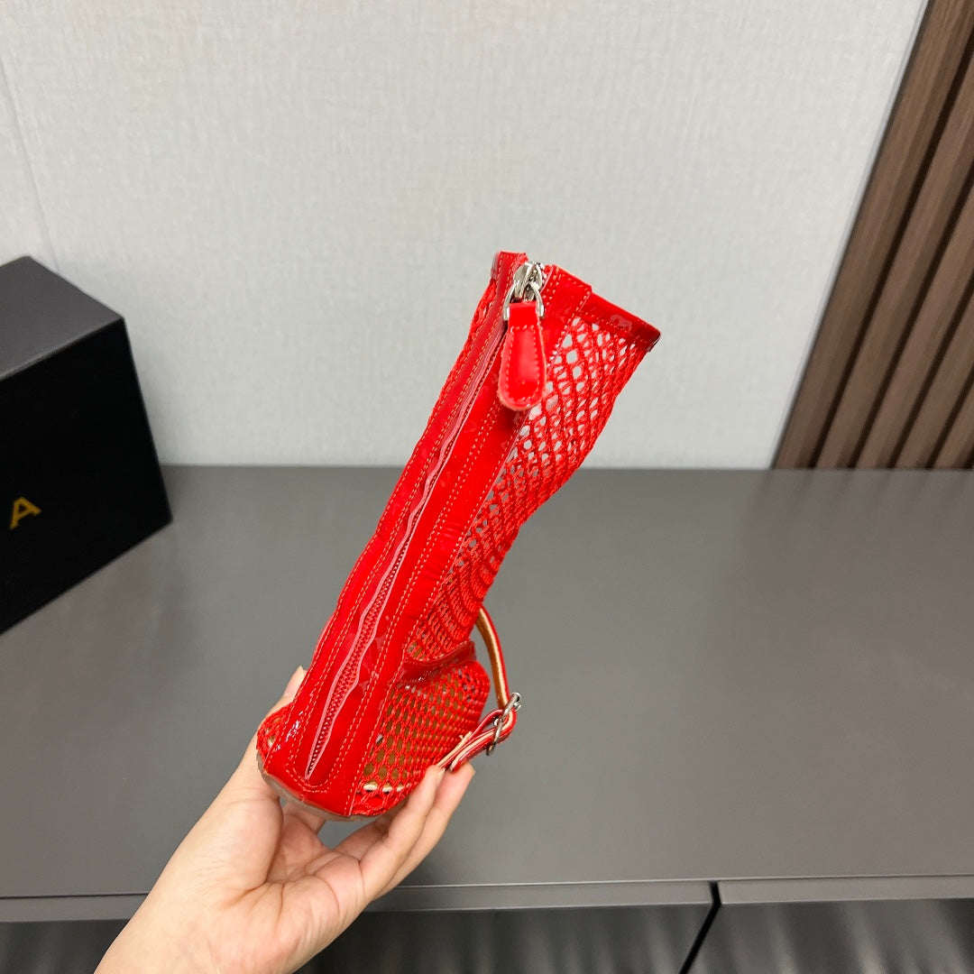 ALAIA SHORT BOOTS IN ORANGE RED MESH FISHNET