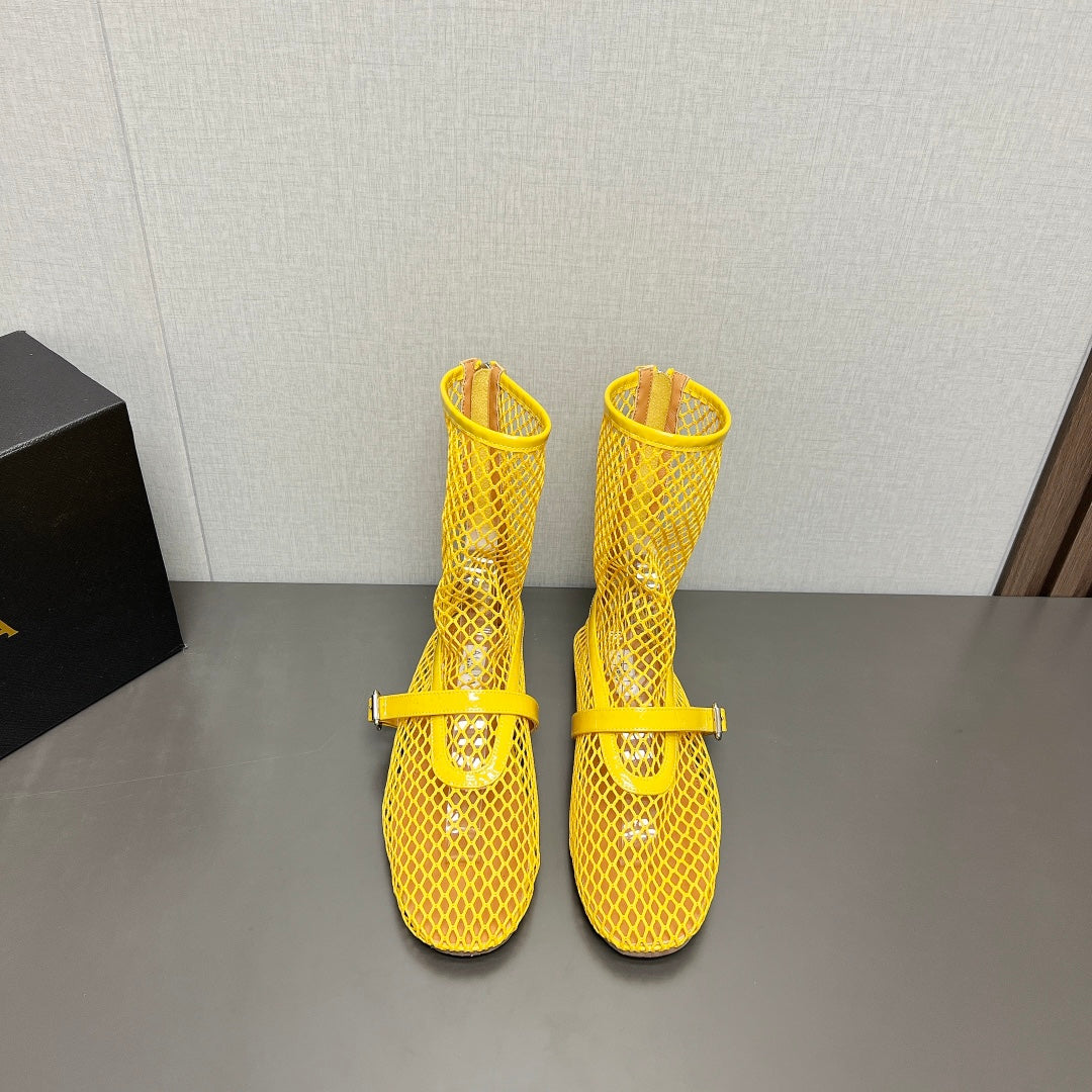 ALAIA SHORT BOOTS IN LEMON YELLOW MESH FISHNET