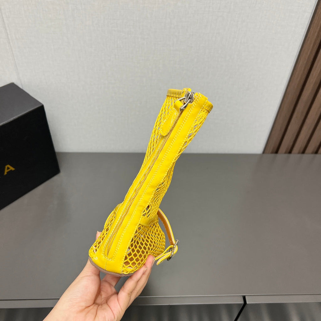 ALAIA SHORT BOOTS IN LEMON YELLOW MESH FISHNET