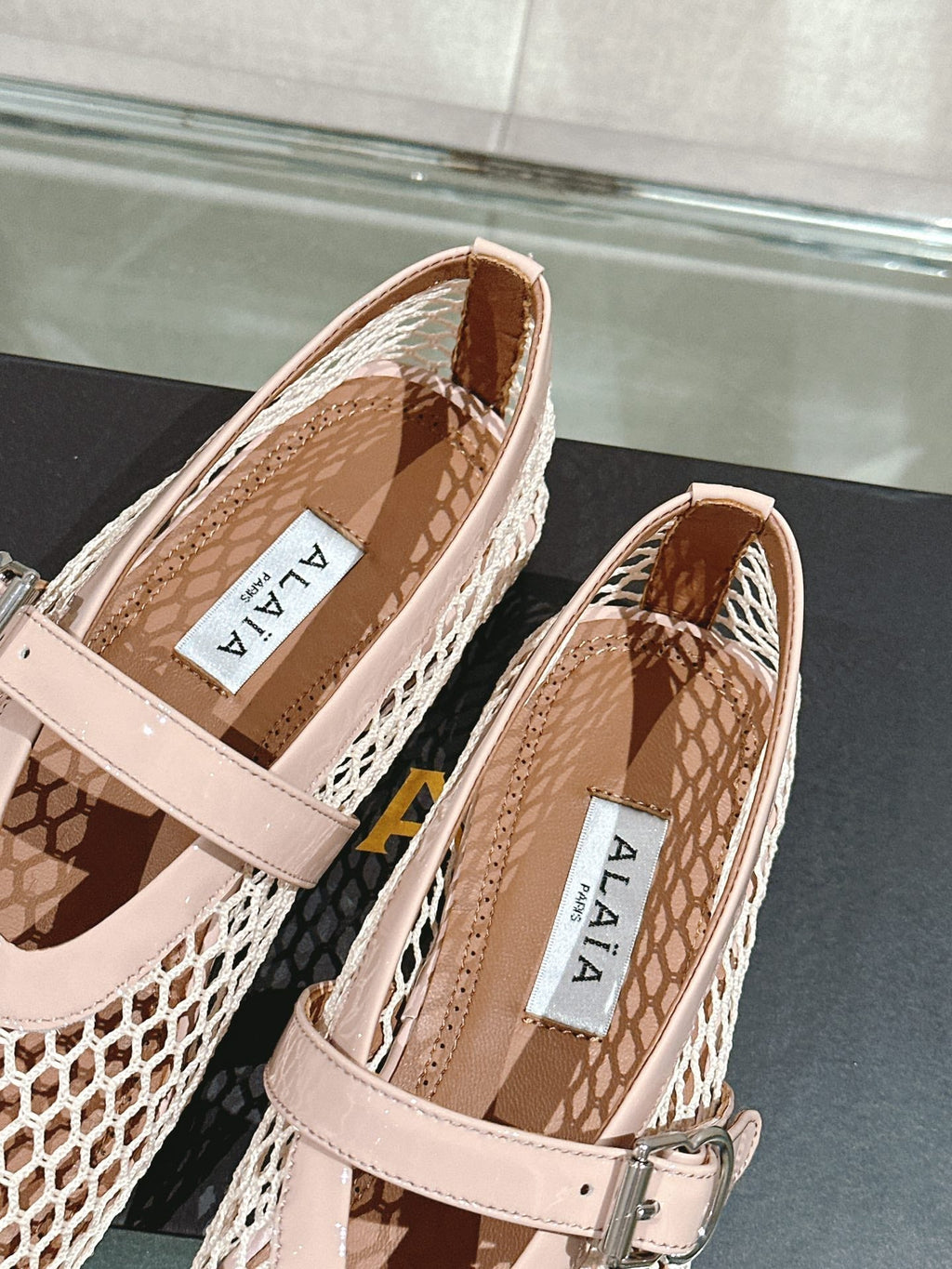 ALAIA BALLET FLATS IN NUDE BEIGE MESH