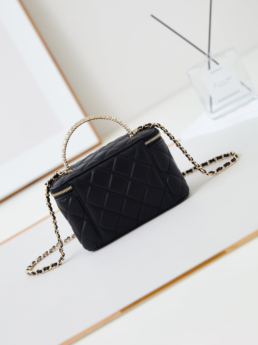 CHANEL 25S MINI VANITY BAG 16 CM IN BLACK LAMBSKIN WITH CRYSTAL-EMBELLISHED CC LOGO