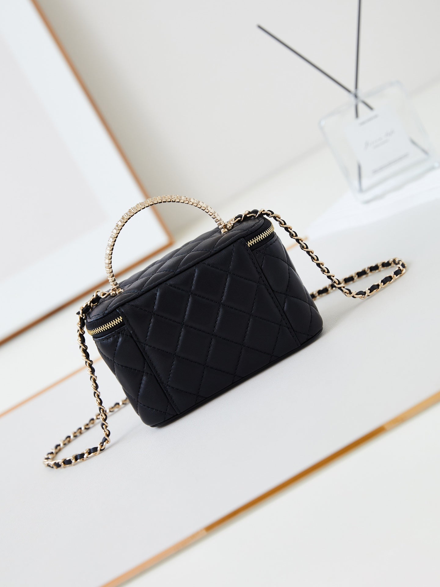 CHANEL 25S MINI VANITY BAG 16 CM IN BLACK LAMBSKIN WITH CRYSTAL-EMBELLISHED CC LOGO