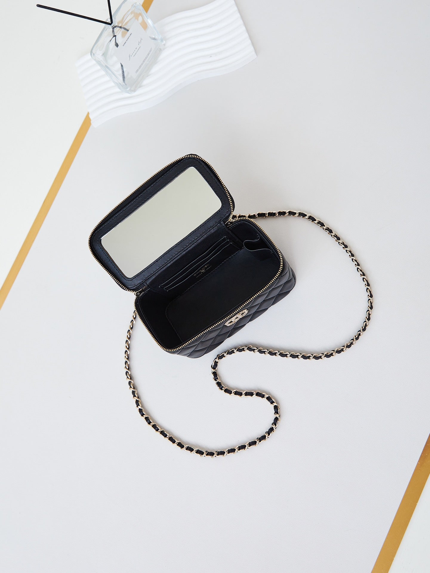 CHANEL 25S MINI VANITY BAG 16 CM IN BLACK LAMBSKIN WITH CRYSTAL-EMBELLISHED CC LOGO